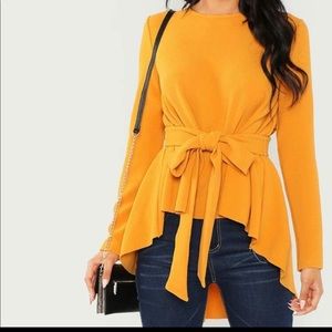 Asymmetrical hem top